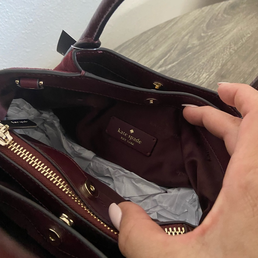 Kate Spade Dark Merlot Suede Satchel
Measurements: Length 9.88  Height 8 - Picture 11 of 12